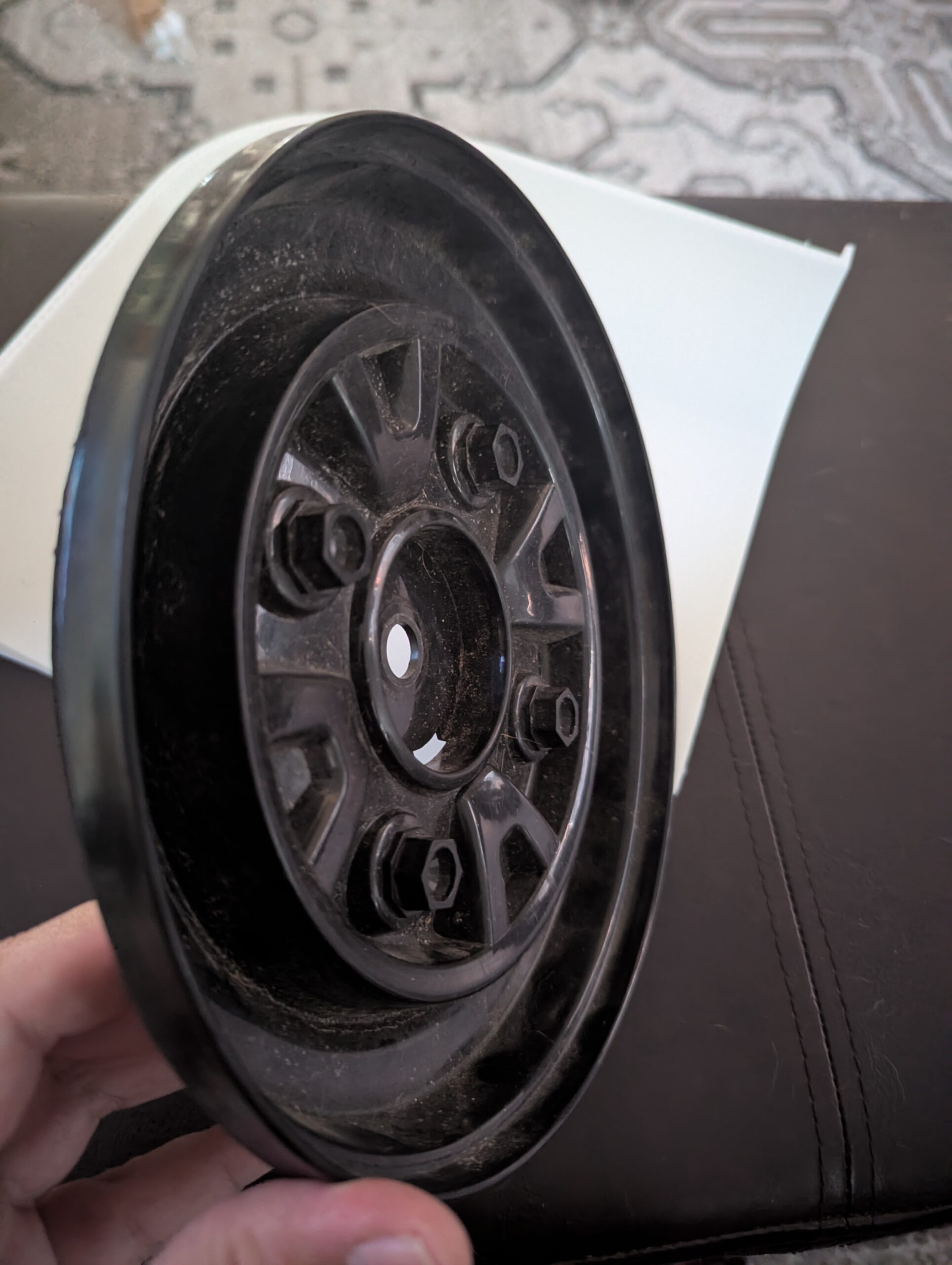 Original factory hub cap from the Power Wheels wheel.
